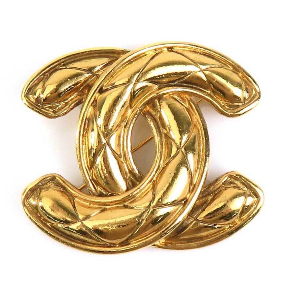 CHANEL Gold Logo Brooch